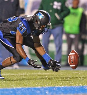 Chris Brown recovers a blocked punt for TD. (Top) Jordan Parker. (Photos courtesy goblueraiders.com)