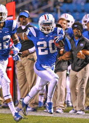 Kevin Byard with a pick 6 against Florida International.  (Top) Shane Tucker leaps in for a score in the same game.