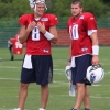 Titans quarterbacks Matt Hasselbeck (left) and rookie Jake Locker talk at training camp. Photos by Bracken Mayo